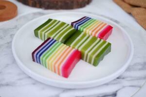 Kue Lapis or or Rainbow sticky layer cake, Indonesian traditional dessert photo