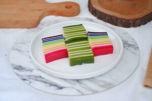 Kue Lapis or or Rainbow sticky layer cake, Indonesian traditional dessert photo