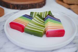 Kue Lapis or or Rainbow sticky layer cake, Indonesian traditional dessert photo