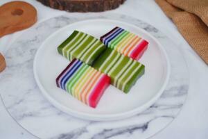 Kue Lapis or or Rainbow sticky layer cake, Indonesian traditional dessert photo