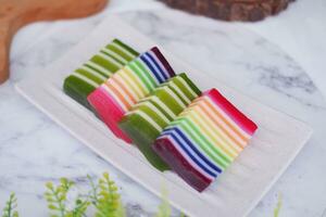 Kue Lapis or or Rainbow sticky layer cake, Indonesian traditional dessert photo