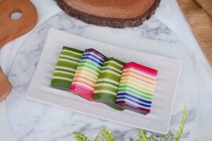 Kue Lapis or or Rainbow sticky layer cake, Indonesian traditional dessert photo