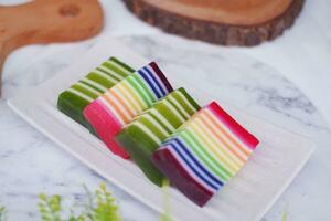 Kue Lapis or or Rainbow sticky layer cake, Indonesian traditional dessert photo