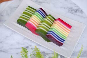 Kue Lapis or or Rainbow sticky layer cake, Indonesian traditional dessert photo