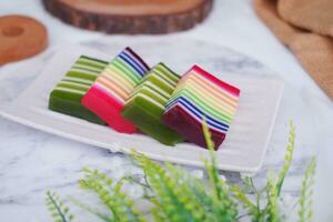 Kue Lapis or or Rainbow sticky layer cake, Indonesian traditional dessert photo