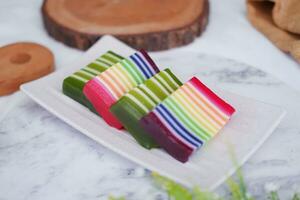 Kue Lapis or or Rainbow sticky layer cake, Indonesian traditional dessert photo