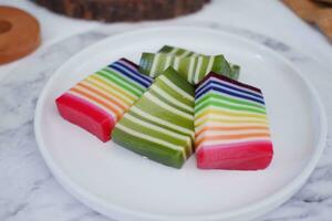 Kue Lapis or or Rainbow sticky layer cake, Indonesian traditional dessert photo
