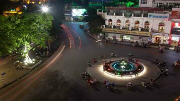 Time lapse shot of circular intersection at night, aerial view of Quang truong Dong Kinh Nghia Thuc, Hanoi, Vietnam video