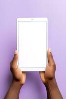 Hand holding tablet with mockup blank screen isolated on purple background. ai generated photo