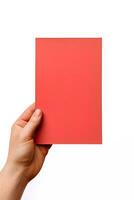un humano mano participación un blanco sábana de rojo papel o tarjeta aislado en blanco antecedentes. ai generado foto