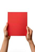 A human hand holding a blank sheet of red paper or card isolated on white background. ai generated photo