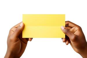 A human hand holding a blank sheet of yellow paper or card isolated on white background. ai generated photo