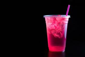 Pink drink in plastic cup isolated on black background. Take away drinks concept with copy space. ai generated photo