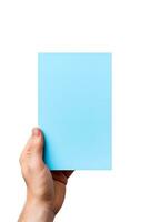 A human hand holding a blank sheet of blue paper or card isolated on white background. ai generated photo