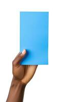 A human hand holding a blank sheet of blue paper or card isolated on white background. ai generated photo