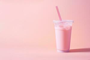 Pink drink in plastic cup isolated on pink background. Take away drinks concept with copy space. ai generated photo