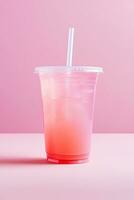 Pink drink in plastic cup isolated on pink background. Take away drinks concept. ai generated photo