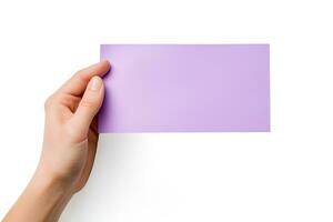 A human hand holding a blank sheet of purple paper or card isolated on a white background. ai generated photo