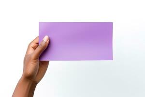 A human hand holding a blank sheet of purple paper or card isolated on a white background. ai generated photo