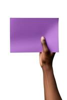 A human hand holding a blank sheet of purple paper or card isolated on a white background. ai generated photo