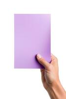 A human hand holding a blank sheet of purple paper or card isolated on a white background. ai generated photo