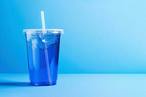 Blue drink in a plastic cup isolated on a blue background. Take away drinks concept with copy space. ai generated photo