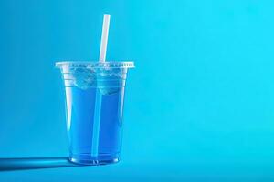 Blue drink in a plastic cup isolated on a blue background. Take away drinks concept with copy space. ai generated photo