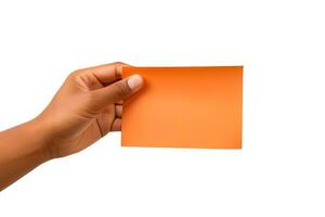 A human hand holding a blank sheet of orange paper or card isolated on a white background. ai generated photo