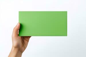 un humano mano participación un blanco sábana de verde papel o tarjeta aislado en un blanco antecedentes. ai generado foto
