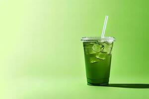 Green drink in a plastic cup isolated on a green background. Take away drinks concept with copy space. ai generated photo