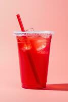 Red drink in a plastic cup isolated on a red pastel background. Take away drinks concept. ai generated photo