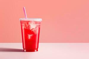 Red drink in a plastic cup isolated on a red pastel background. Take away drinks concept with copy space. ai generated photo