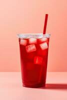 Red drink in a plastic cup isolated on a red pastel background. Take away drinks concept. ai generated photo