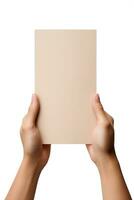 A human hand holding a blank sheet of beige paper or card isolated on a white background. ai generated photo