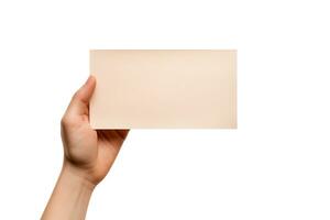 A human hand holding a blank sheet of beige paper or card isolated on a white background. ai generated photo