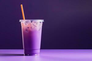 Purple drink in a plastic cup isolated on a purple background. Take away drinks concept with copy space. ai generated photo