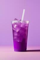 Purple drink in a plastic cup isolated on a purple background. Take away drinks concept. ai generated photo