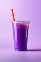 Purple drink in a plastic cup isolated on a purple background. Take away drinks concept. ai generated photo