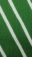 green and white striped fabric texture background. ai generated photo