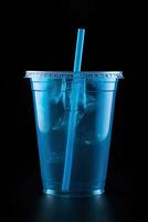 Blue drink in a plastic cup isolated on a black background. Take away drinks concept. ai generated photo