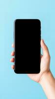 Hand holding smartphone with a black blank screen isolated on a blue background. ai generated photo