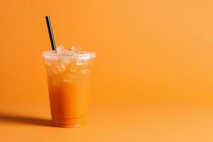 Orange color drink in a plastic cup isolated on a orange color background. Take away drinks concept with copy space. ai generated photo