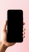 Hand holding smartphone with a black blank screen isolated on a pink background. ai generated photo