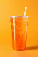 Orange color drink in a plastic cup isolated on a orange color background. Take away drinks concept. ai generated photo