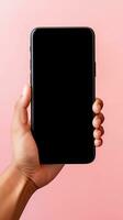 Hand holding smartphone with a black blank screen isolated on a pink background. ai generated photo