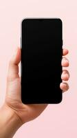 Hand holding smartphone with a black blank screen isolated on a pink background. ai generated photo