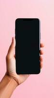 Hand holding smartphone with a black blank screen isolated on a pink background. ai generated photo