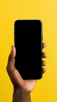 Hand holding smartphone with a black blank screen isolated on a yellow background. ai generated photo