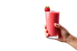 Hand holds a glass of fresh strawberry smoothie. Summer drink milkshake and refreshment organic concept with copy space. ai generated photo