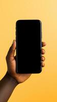 Hand holding smartphone with a black blank screen isolated on a yellow background. ai generated photo